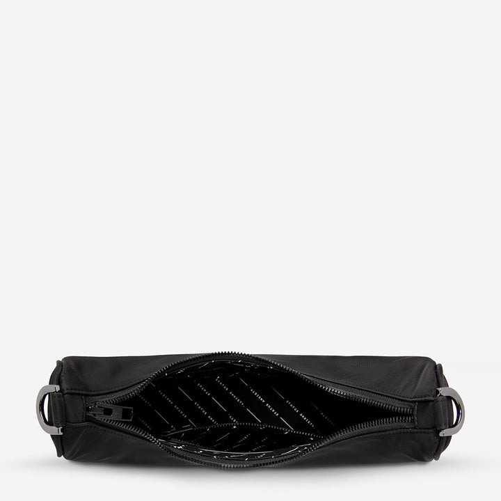 https://cdn.shopify.com/s/files/1/0214/8218/files/status-anxiety-bag-poly-fleur-black-open.jpg?v=1770763823