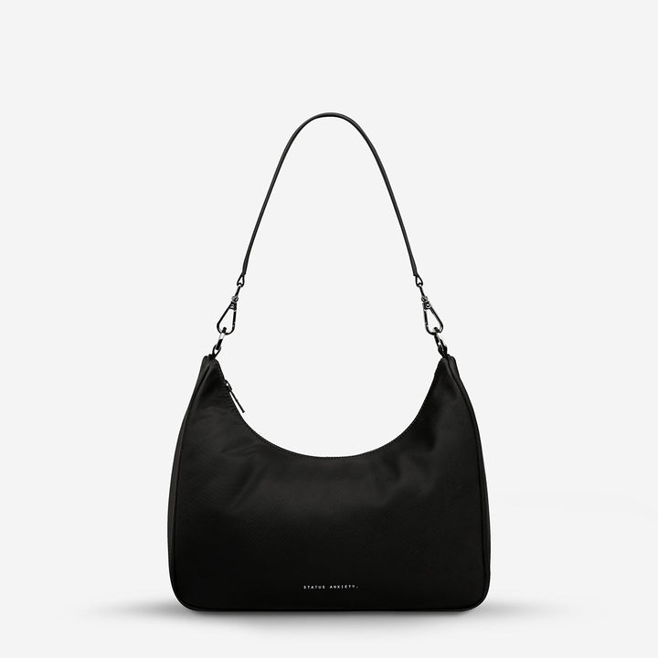 https://cdn.shopify.com/s/files/1/0214/8218/files/status-anxiety-bag-poly-fleur-black-short-strap.jpg?v=1771287950